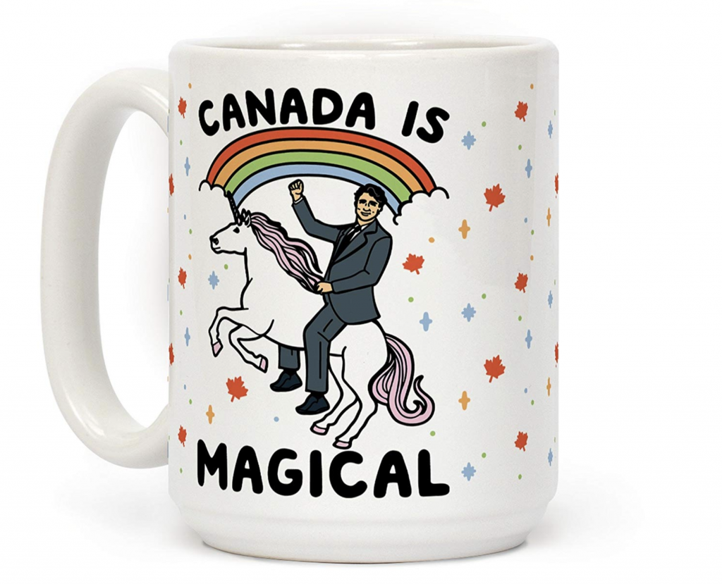 Coffee mug with an illustration of Justin Trudeau riding a unicorn with the caption "Canada is magical"